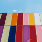 A range of coloured squares illustrating diversity in the workplace