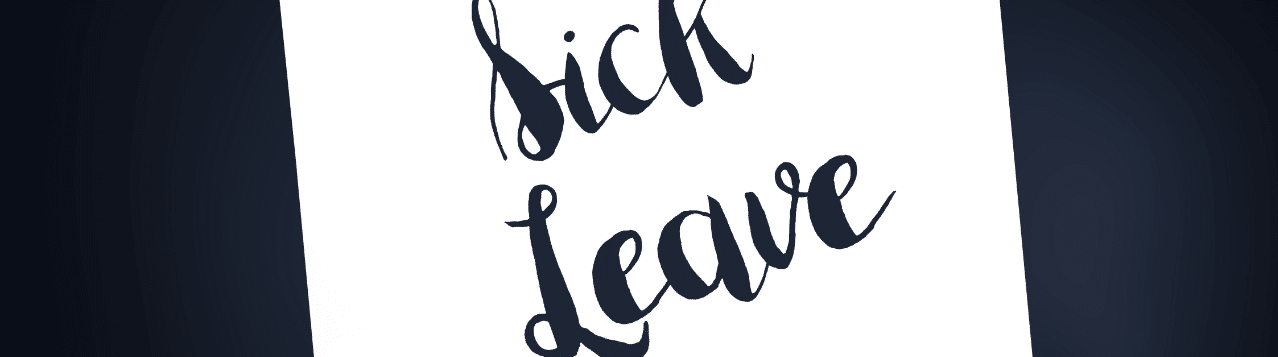 Hand holding a sign up that says 'sick leave'
