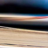 A pile of paperwork close up