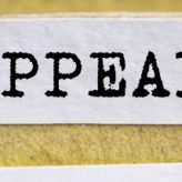 A filing cabinet with an appeal file label