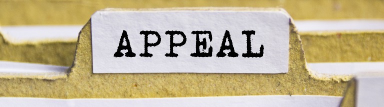 A filing cabinet with an appeal file label