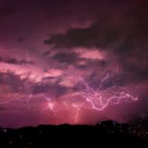 Thunder and lightning with a purple hue
