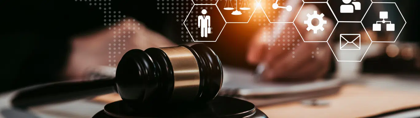 A black judges gavel with digital symbols appearing